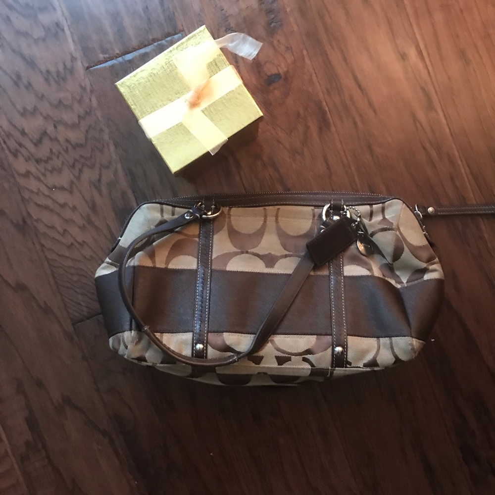 Brown Coach Signature logo purse